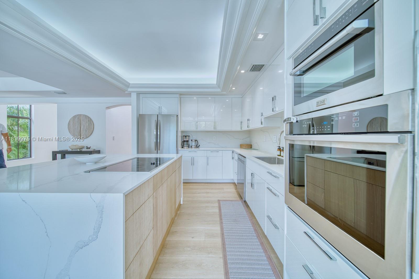 12480 Southwest 97th Street Miami, FL 33186 - Photo 23 of 64 a large kitchen with a large window