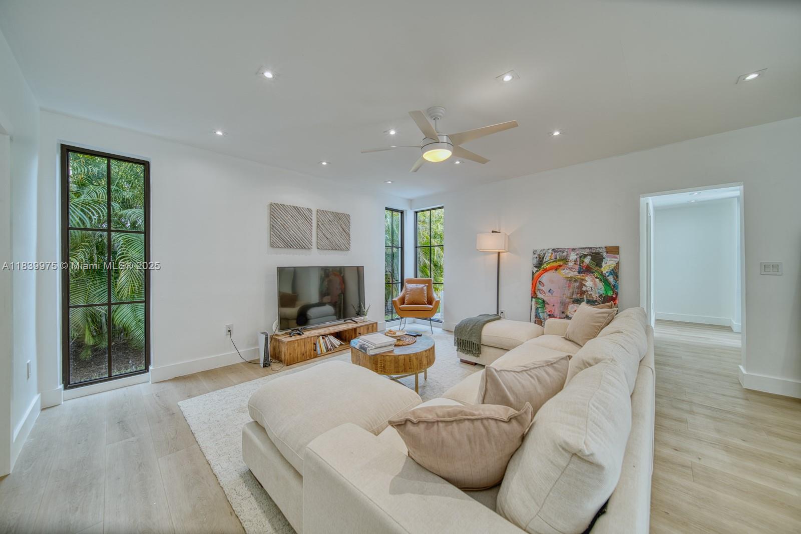 12480 Southwest 97th Street Miami, FL 33186 - Photo 26 of 64 a living room with furniture and a window
