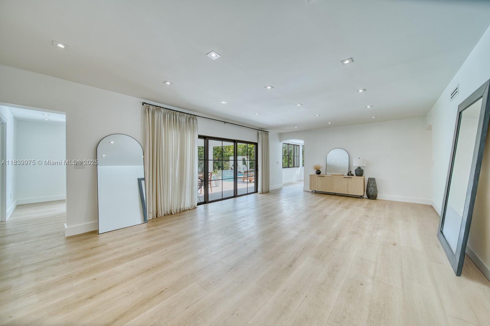 12480 Southwest 97th Street Miami, FL 33186 - Photo 28 of 64 a view of empty room with wooden floor and window