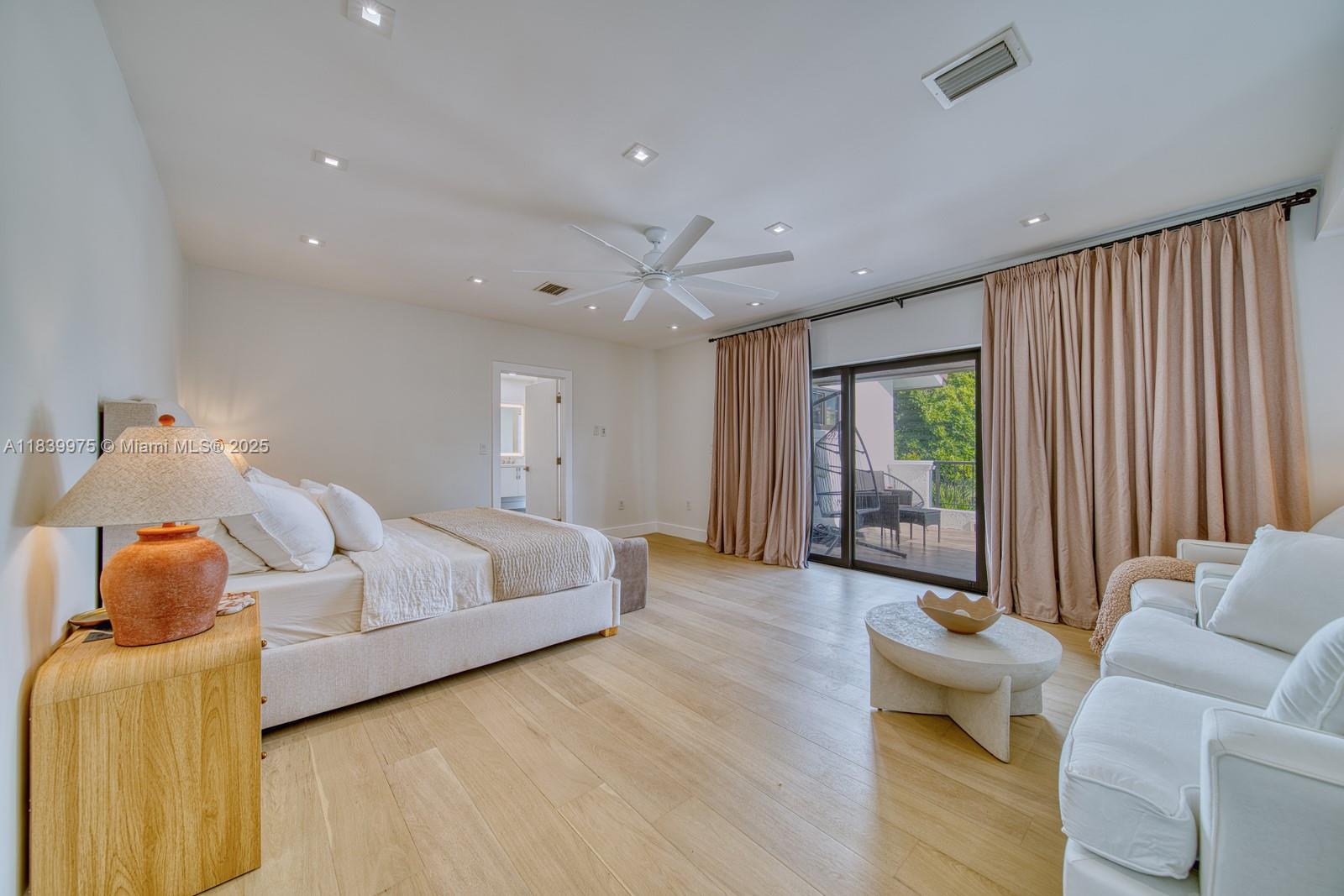 12480 Southwest 97th Street Miami, FL 33186 - Photo 32 of 64 a living room with furniture and a large window