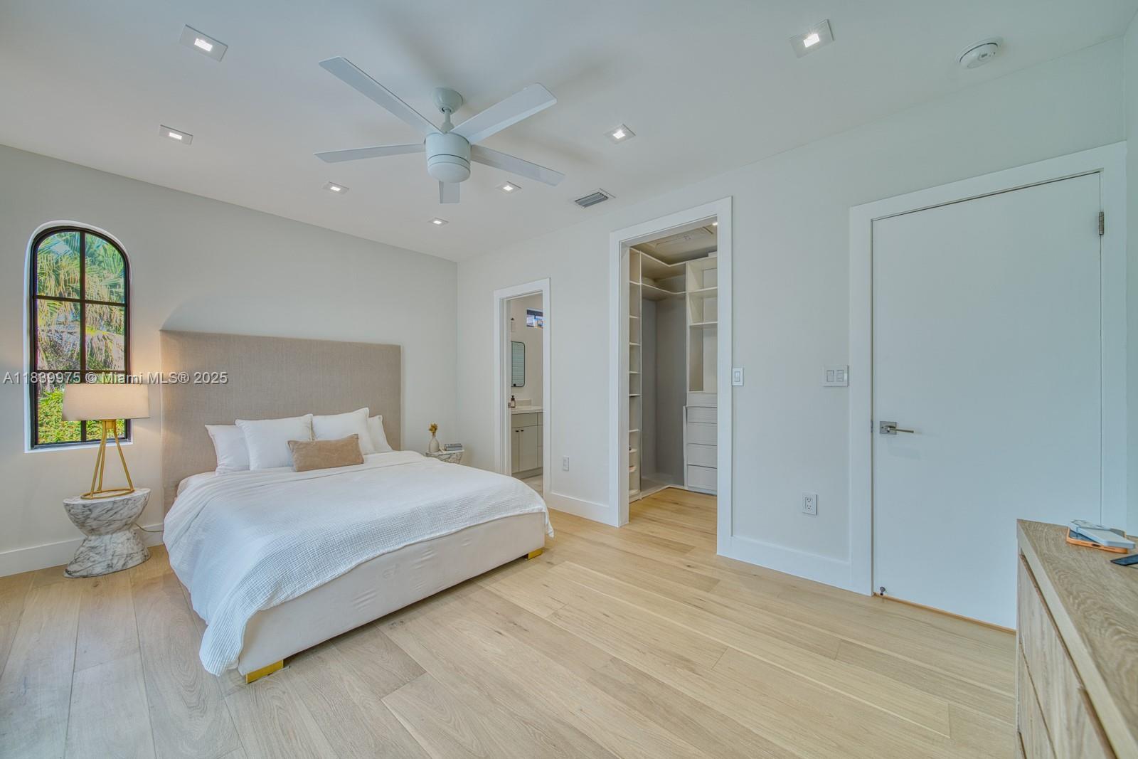 12480 Southwest 97th Street Miami, FL 33186 - Photo 42 of 64 a bedroom with a bed and a couch