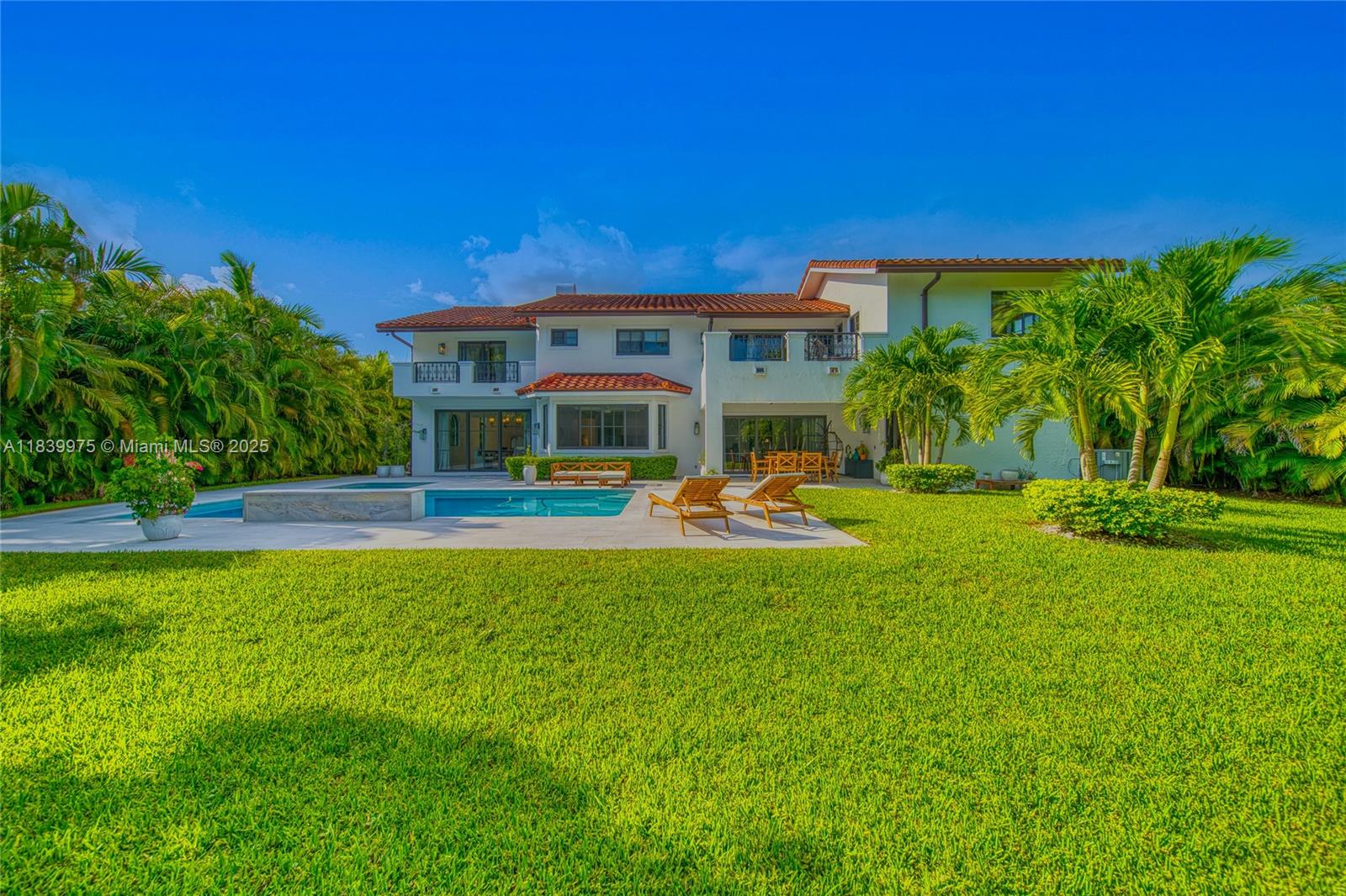 12480 Southwest 97th Street Miami, FL 33186 - Photo 53 of 64 a view of house with swimming pool outdoor seating