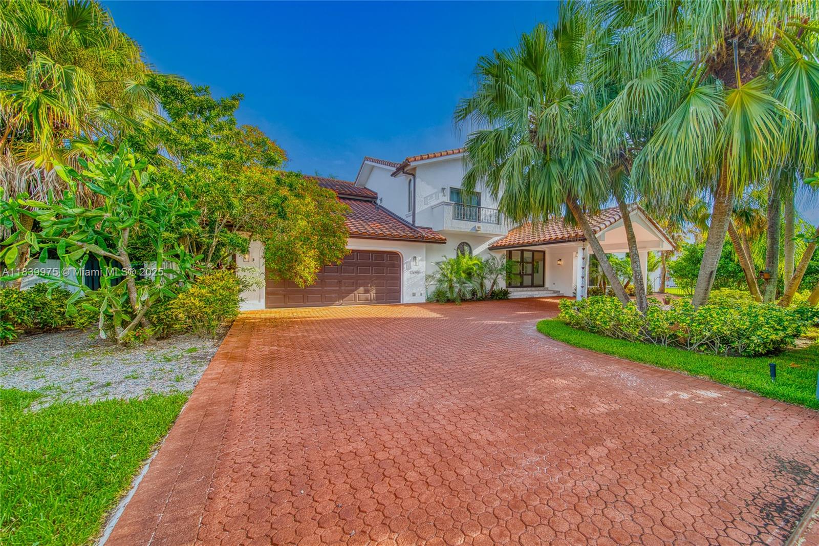 12480 Southwest 97th Street Miami, FL 33186 - Photo 62 of 64 a front view of a house with a yard and a tree