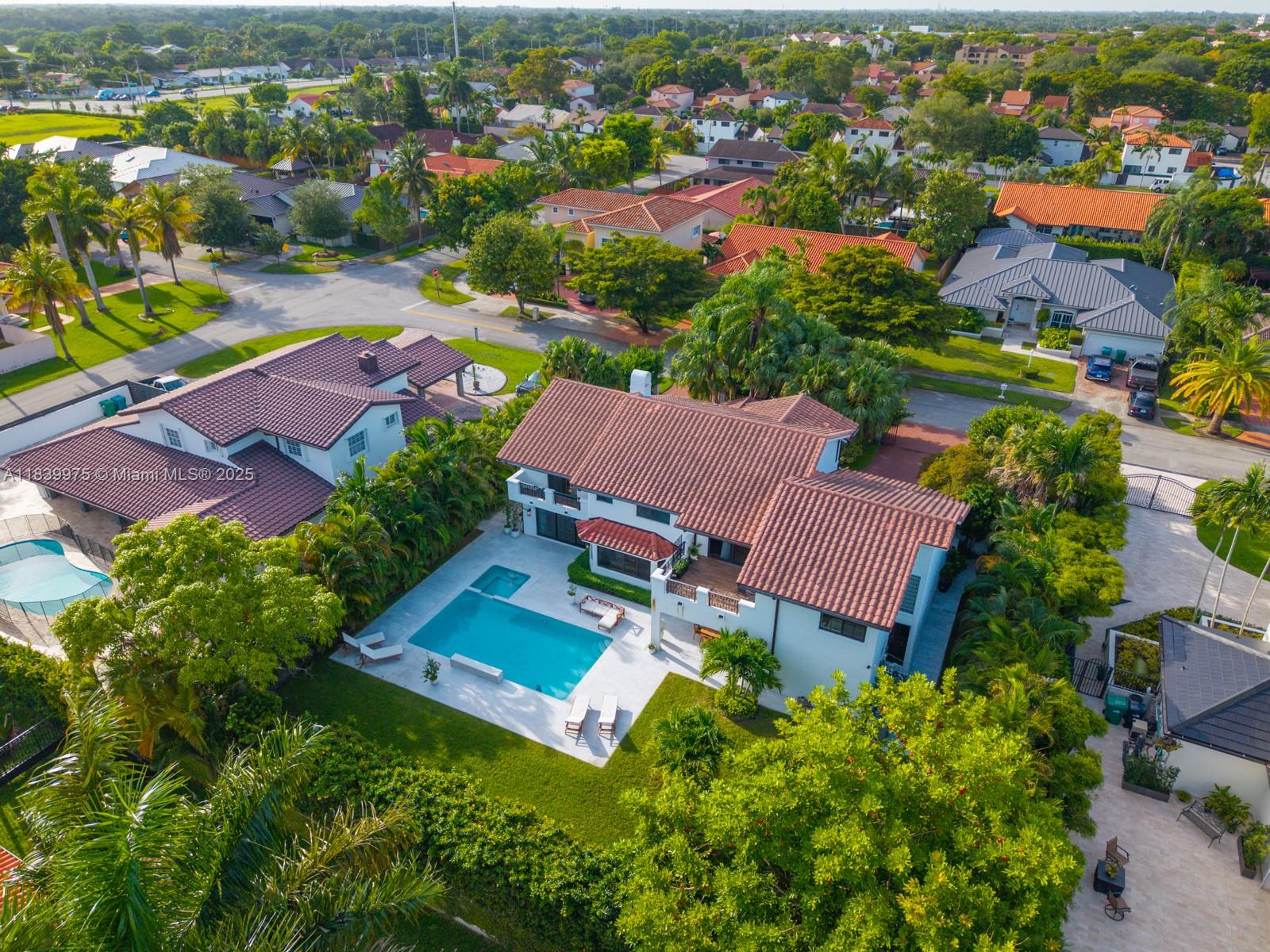 12480 Southwest 97th Street Miami, FL 33186 - Photo 8 of 64 an aerial view of residential houses with outdoor space and a lake view
