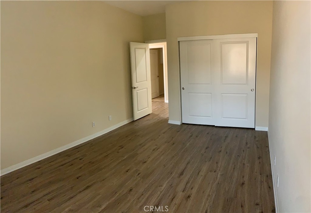 36 Brindisi Irvine, CA 92618 - Photo 17 of 44 an empty room with wooden floor and closet