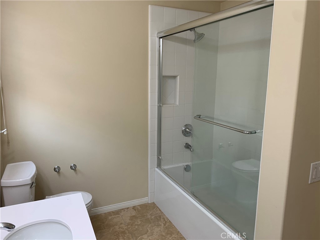 36 Brindisi Irvine, CA 92618 - Photo 19 of 44 a bathroom with a tub and shower
