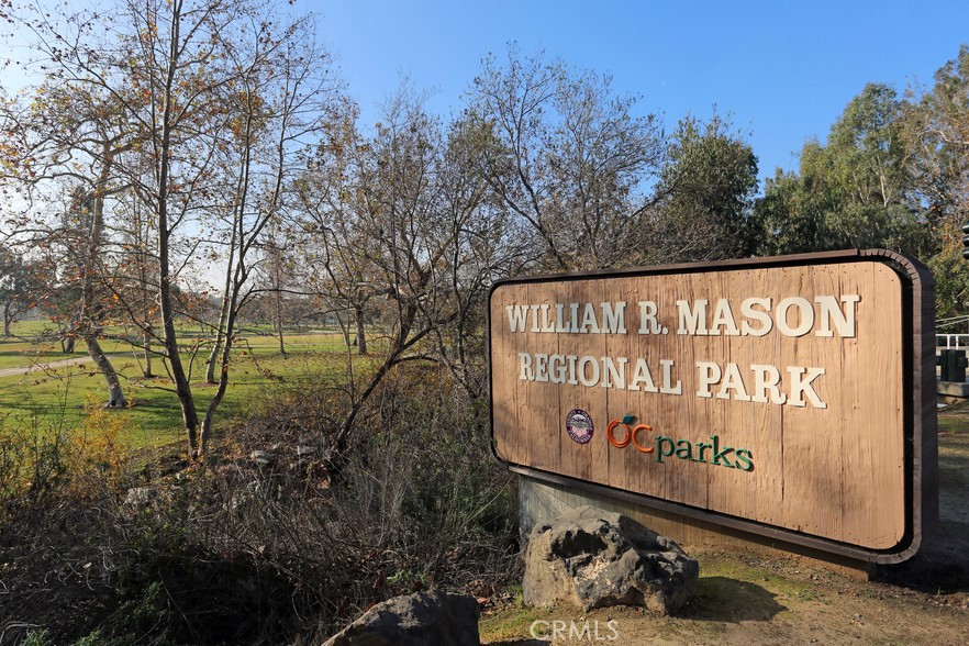 36 Brindisi Irvine, CA 92618 - Photo 36 of 44 a sign on the side of the road