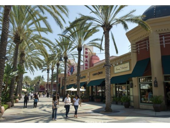 36 Brindisi Irvine, CA 92618 - Photo 41 of 44 a view of a street with stores