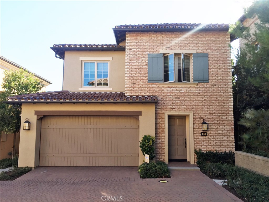 36 Brindisi Irvine, CA 92618 - Photo 44 of 44 a front view of a house with garden