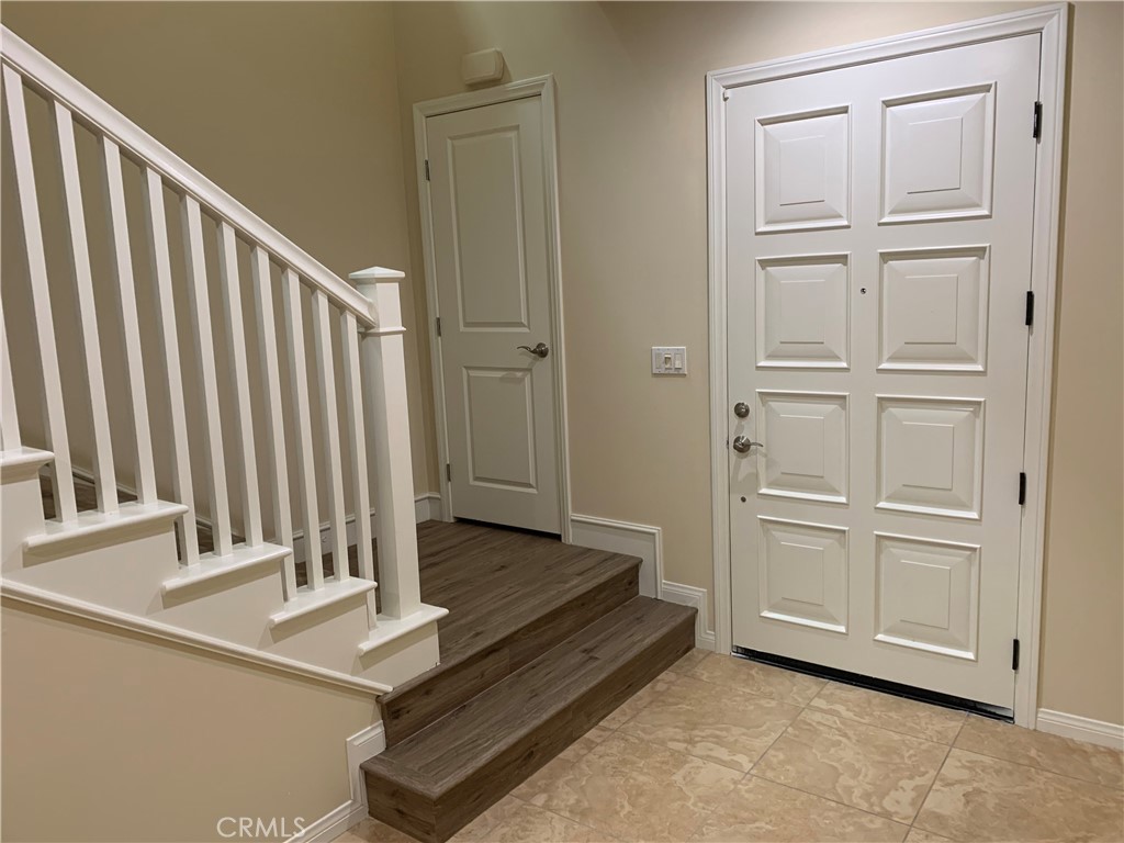 36 Brindisi Irvine, CA 92618 - Photo 8 of 44 a view of a kitchen with wooden floor