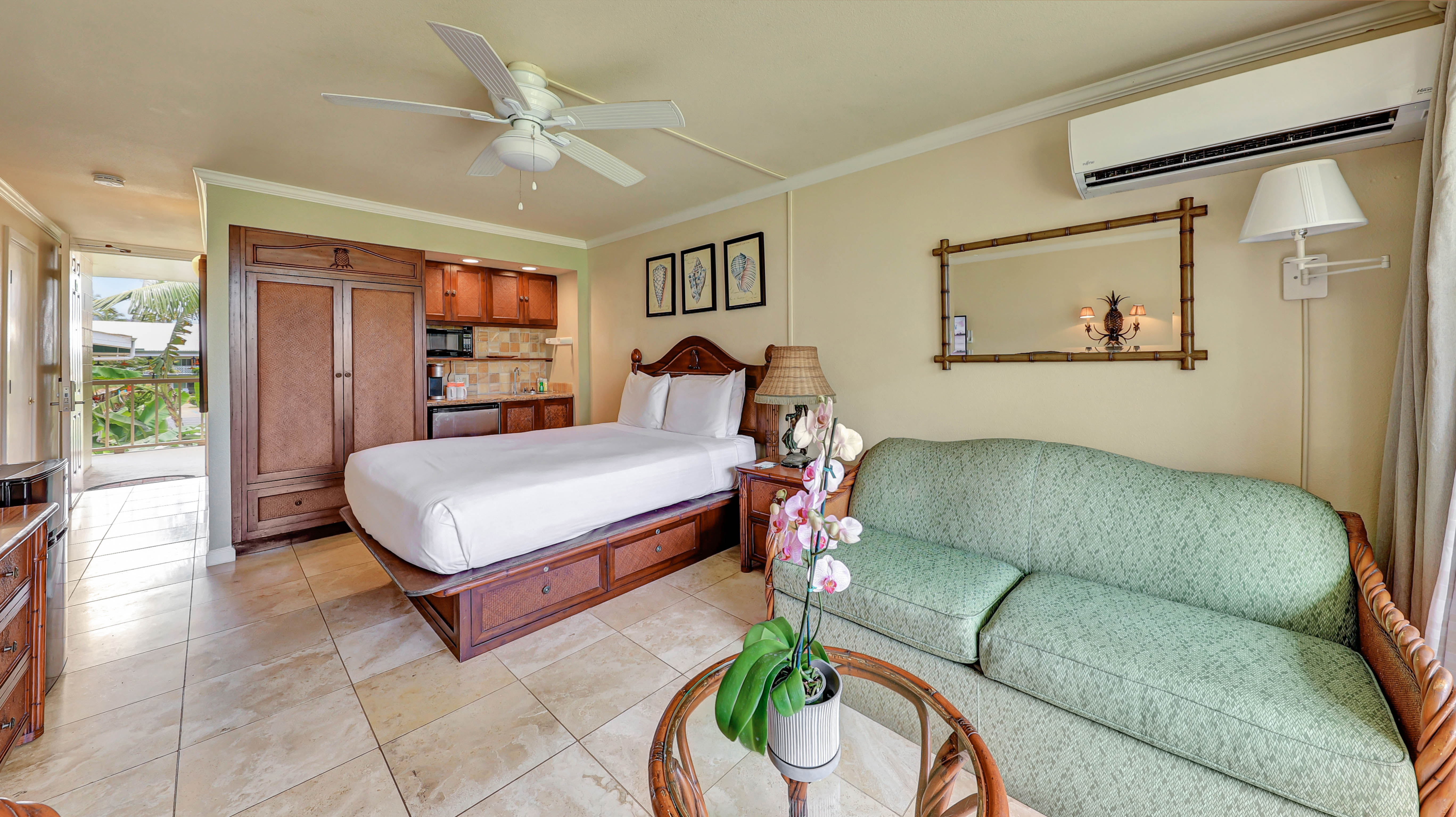 440 Aleka Place, Unit 256 Kapaa, HI 96746 - Photo 2 of 27 a living room with furniture and a large window