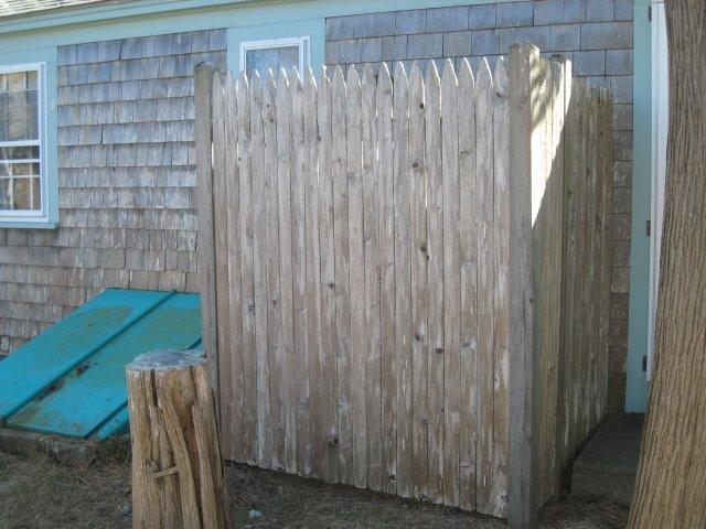 84 Uncle Rolf Road Dennis Port, MA 02639 - Photo 16 of 16 a bathroom with a shower curtain and a large window