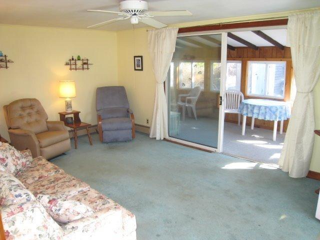 84 Uncle Rolf Road Dennis Port, MA 02639 - Photo 3 of 16 a living room with furniture and a large window