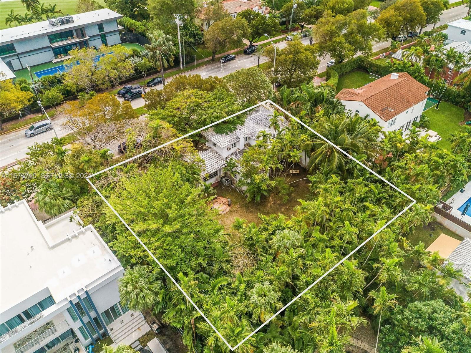 6080 Alton Road Miami Beach, FL 33140 - Photo 5 of 11 a backyard of a house