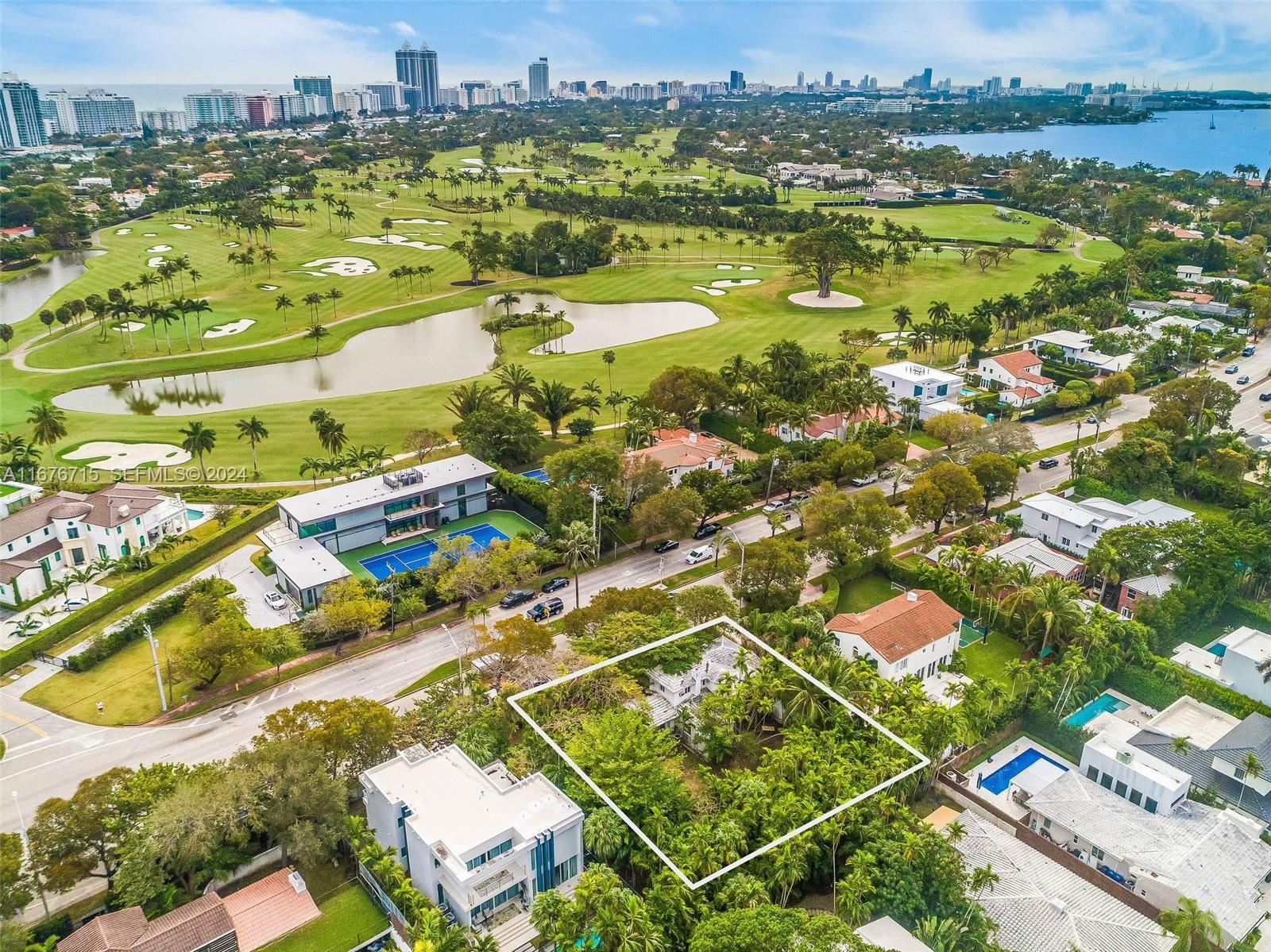6080 Alton Road Miami Beach, FL 33140 - Photo 7 of 11 an aerial view of residential houses with outdoor space