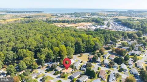 a sign that is on a brick wall