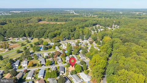 a view of a lake with a house swimming pool and outdoor space