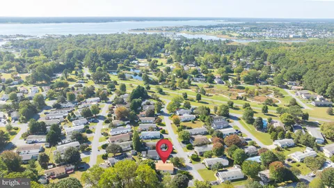 an aerial view of residential house with outdoor space