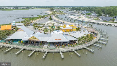 an aerial view of a house with a garden