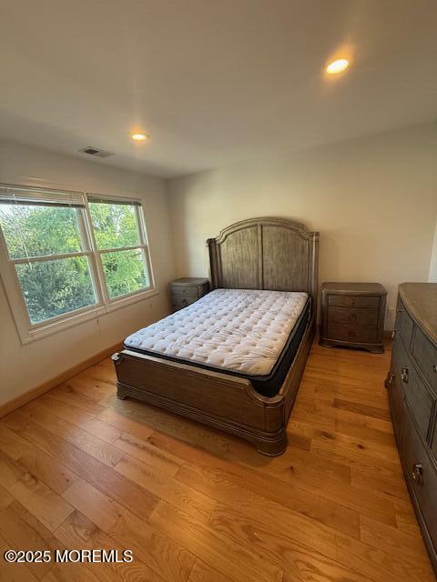 13 Wyckoff Street Deal, NJ 07723 - Photo 2 of 10 a bedroom with a bed and window