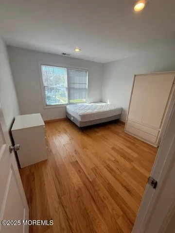 a view of livingroom with furniture and wooden floor