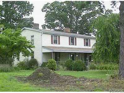 20097 Beaver Dam Road Beaverdam, VA 23015 - Photo 1 of 1 a view of a white house next to a yard with big trees