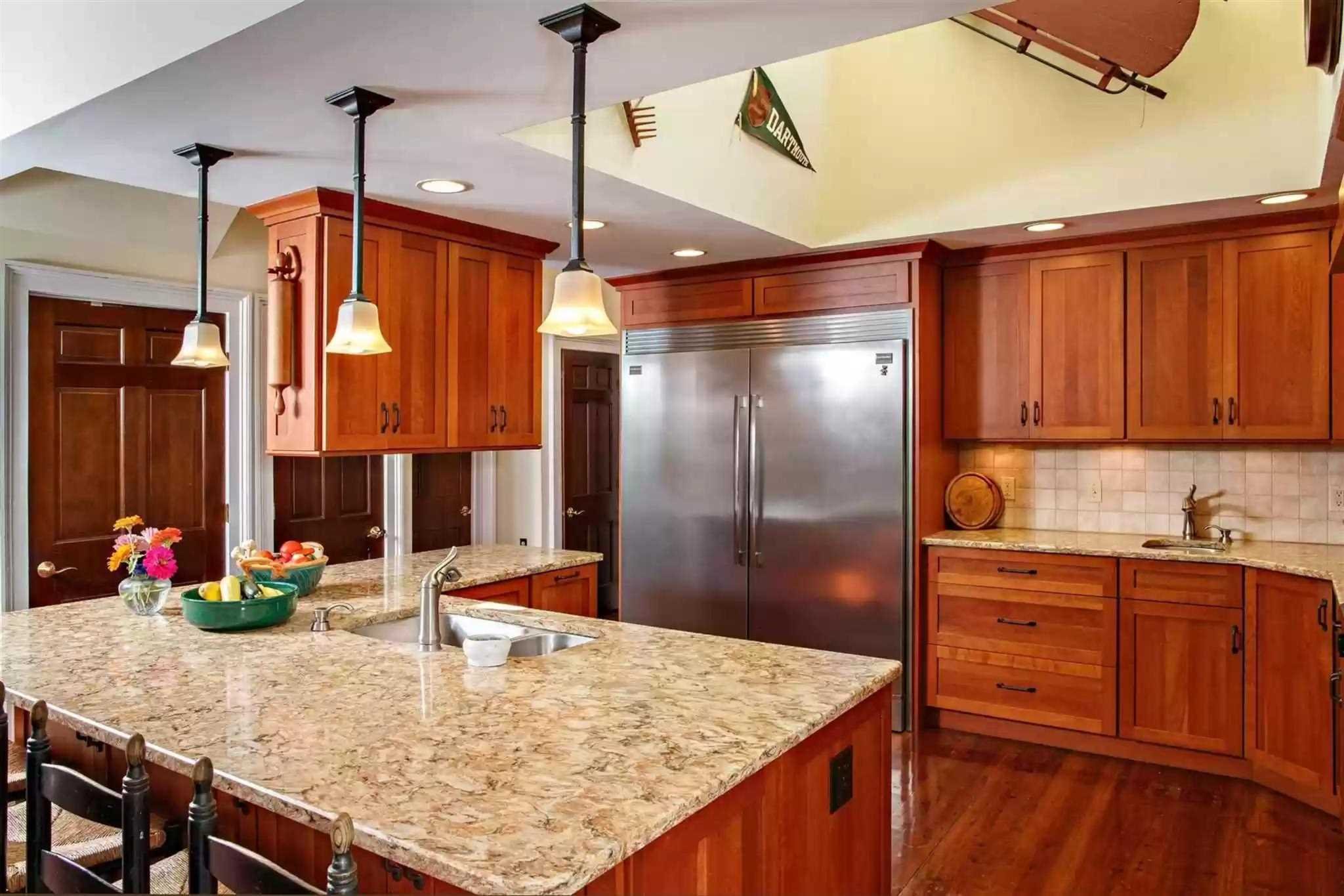 20 Barmore Road LaGrange, NY 12540 - Photo 13 of 32 a kitchen with sink refrigerator dining table and chairs