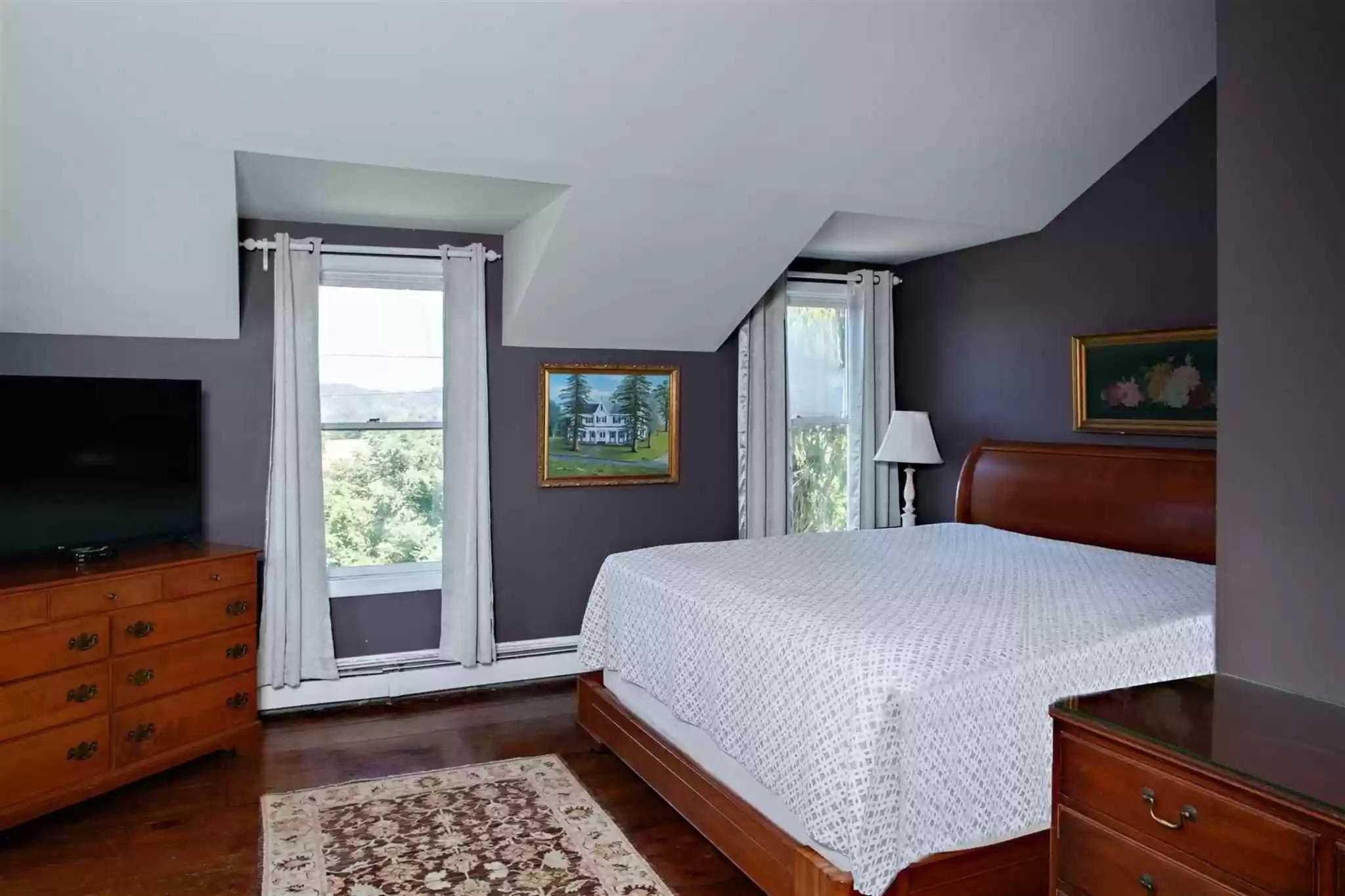 20 Barmore Road LaGrange, NY 12540 - Photo 24 of 32 a bedroom with a large bed and flat tv screen on dresser