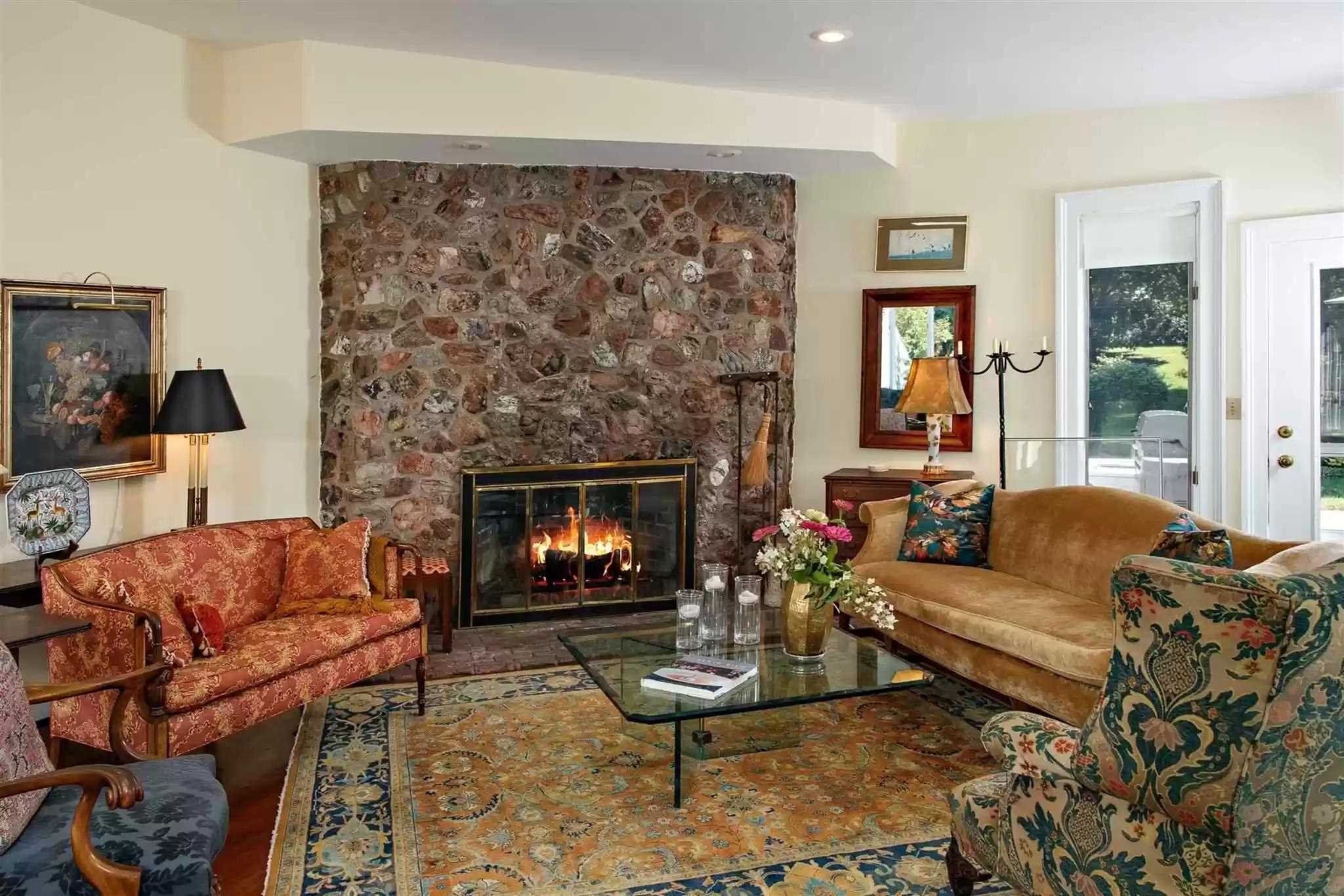 20 Barmore Road LaGrange, NY 12540 - Photo 7 of 32 a living room with furniture a flat screen tv and a fireplace