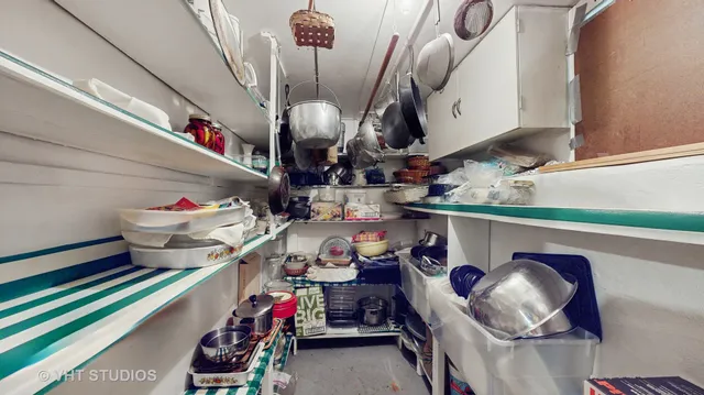 a room with storage and utility