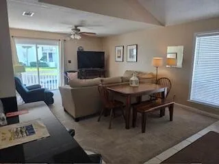 a bedroom with a bed and a desk