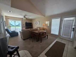 a white toilet sitting next to a bathroom sink and a shower