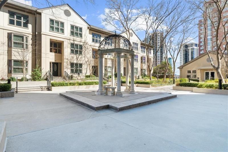 3475 Oak Valley Road Northeast, Unit 410 Atlanta, GA 30326 - Photo 20 of 36 a view of building with street view