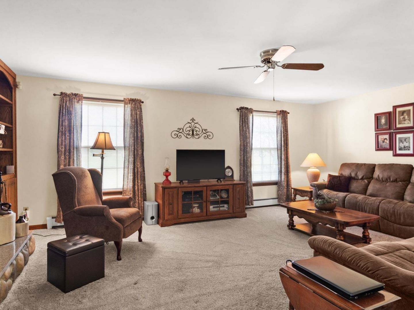 16247 Pratt Road Sandwich, IL 60548 - Photo 15 of 47 a living room with furniture ceiling fan and a window