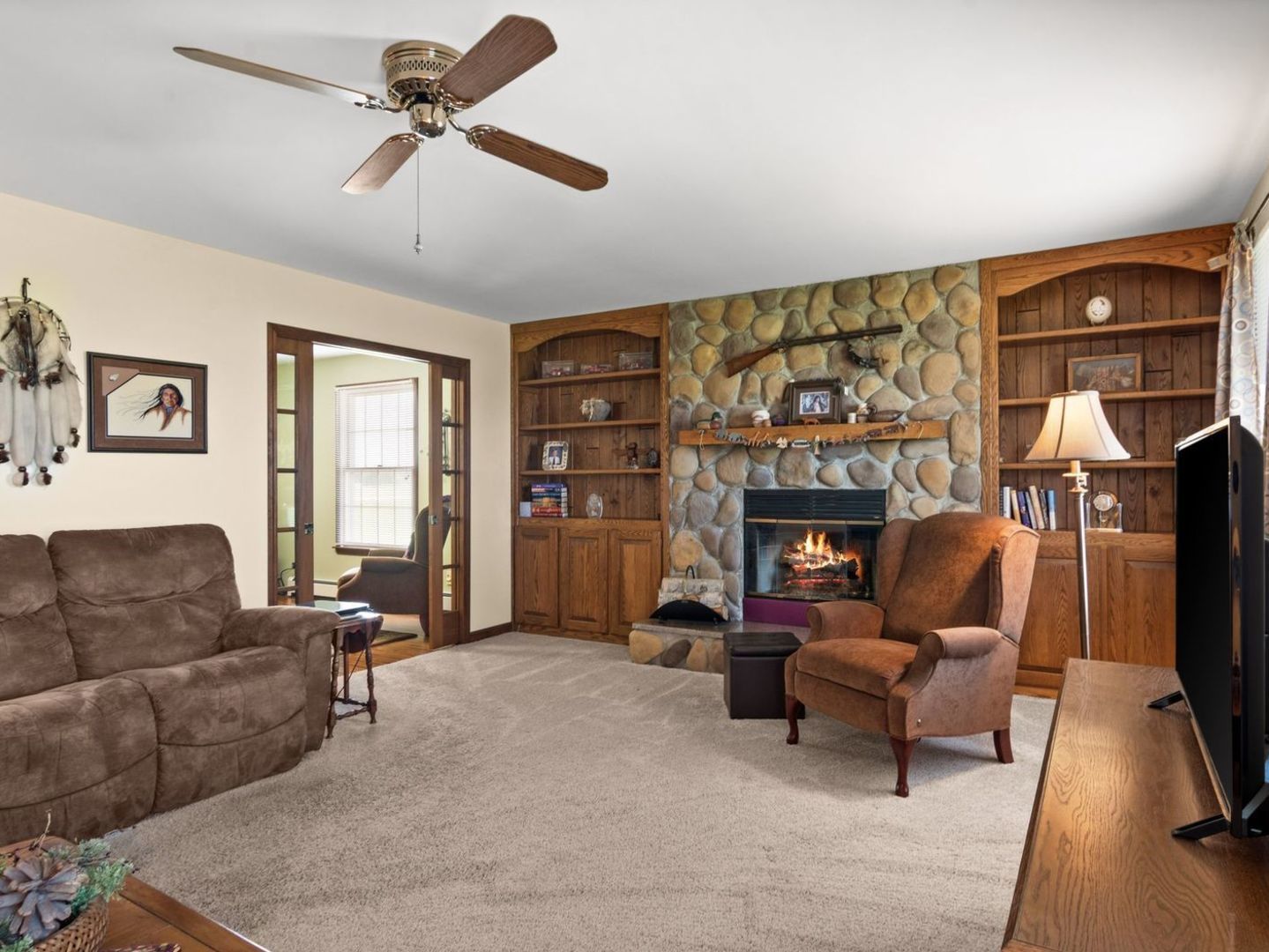 16247 Pratt Road Sandwich, IL 60548 - Photo 16 of 47 a living room with furniture and a fireplace