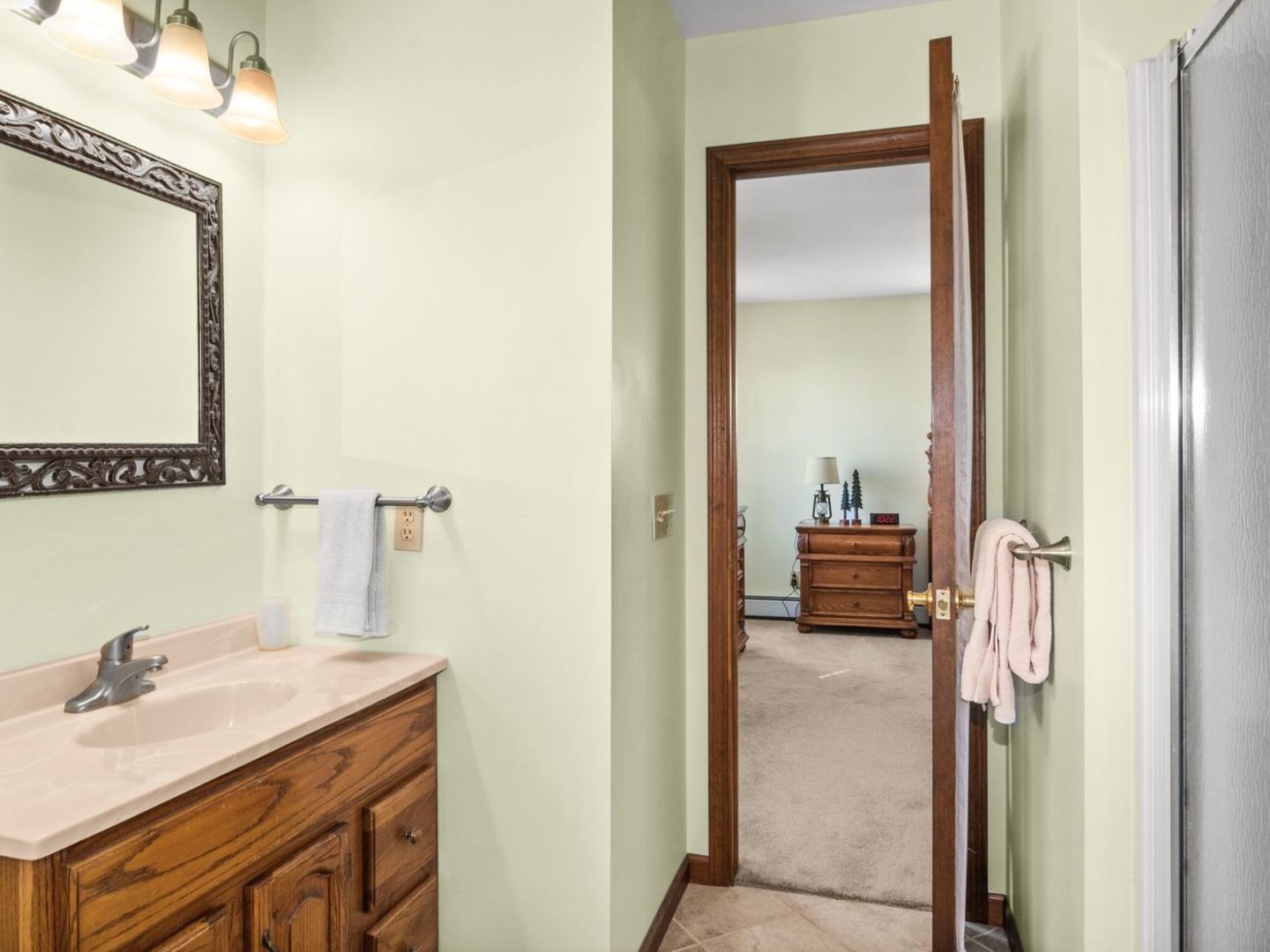 16247 Pratt Road Sandwich, IL 60548 - Photo 24 of 47 a en suite bathroom with a granite countertop sink and a mirror