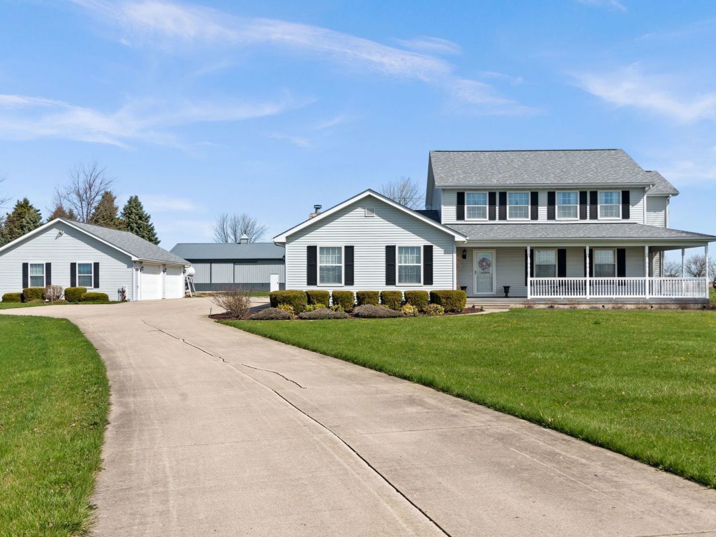 16247 Pratt Road Sandwich, IL 60548 - Photo 30 of 47 a front view of a house with a yard and trees
