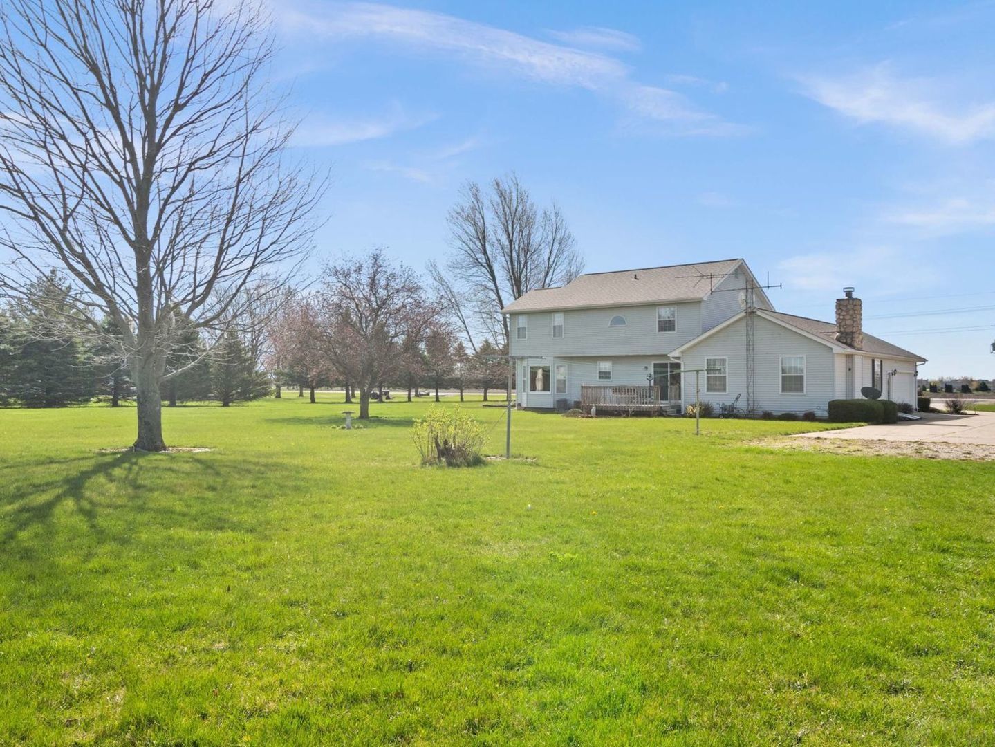 16247 Pratt Road Sandwich, IL 60548 - Photo 39 of 47 a house view with swimming pool in front of it