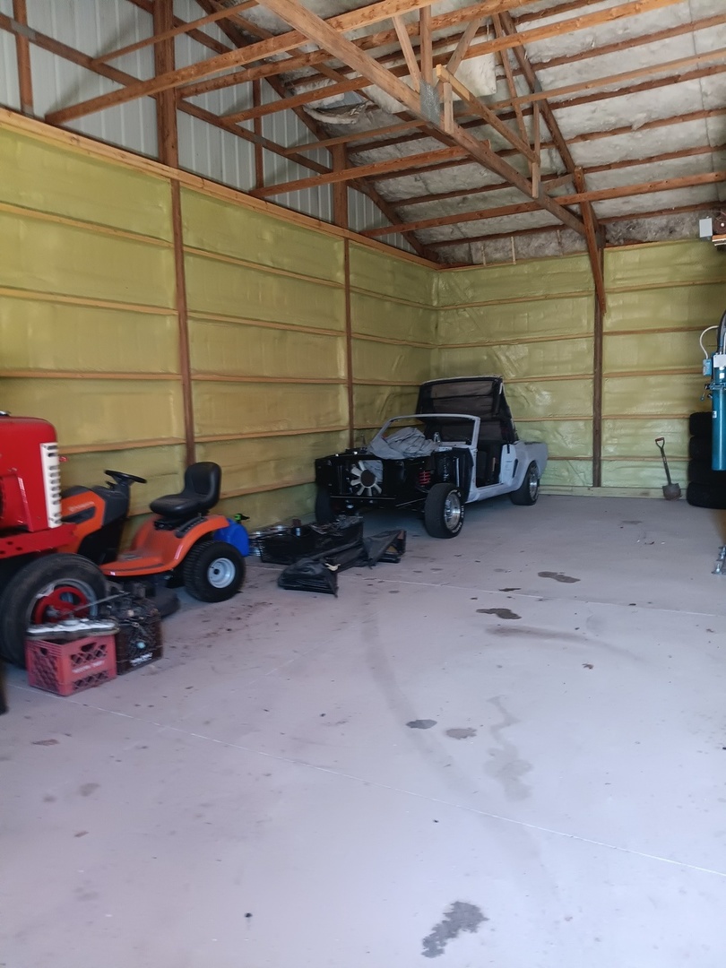 16247 Pratt Road Sandwich, IL 60548 - Photo 46 of 47 a view of a garage with parked cars