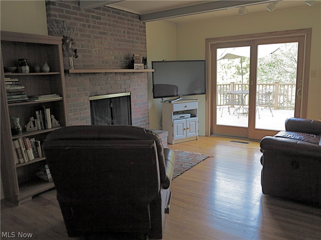 5710 Caranor Road Kent, OH 44240 - Photo 13 of 35 Gas fireplace welcomes you to relax, read, and view your backyard park.