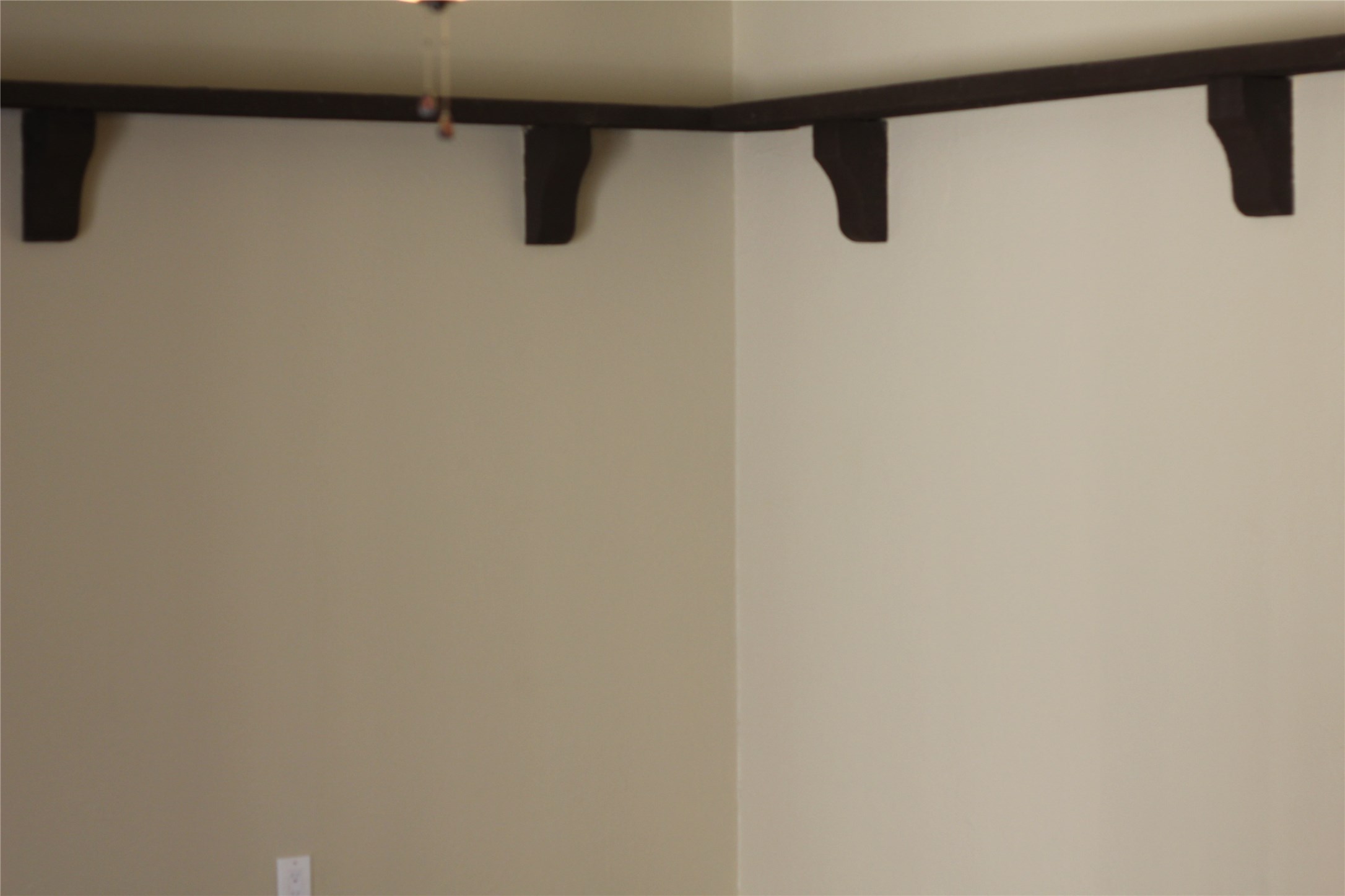 7207 Addicks Clodine Road Houston, TX 77083 - Photo 17 of 30 a view of a wall with rack on the wall