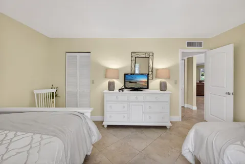 a view of a chair and table in the balcony