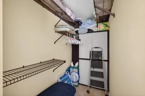 a view of balcony with furniture