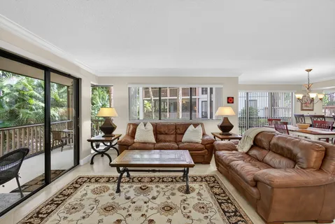 a living room with furniture and a table
