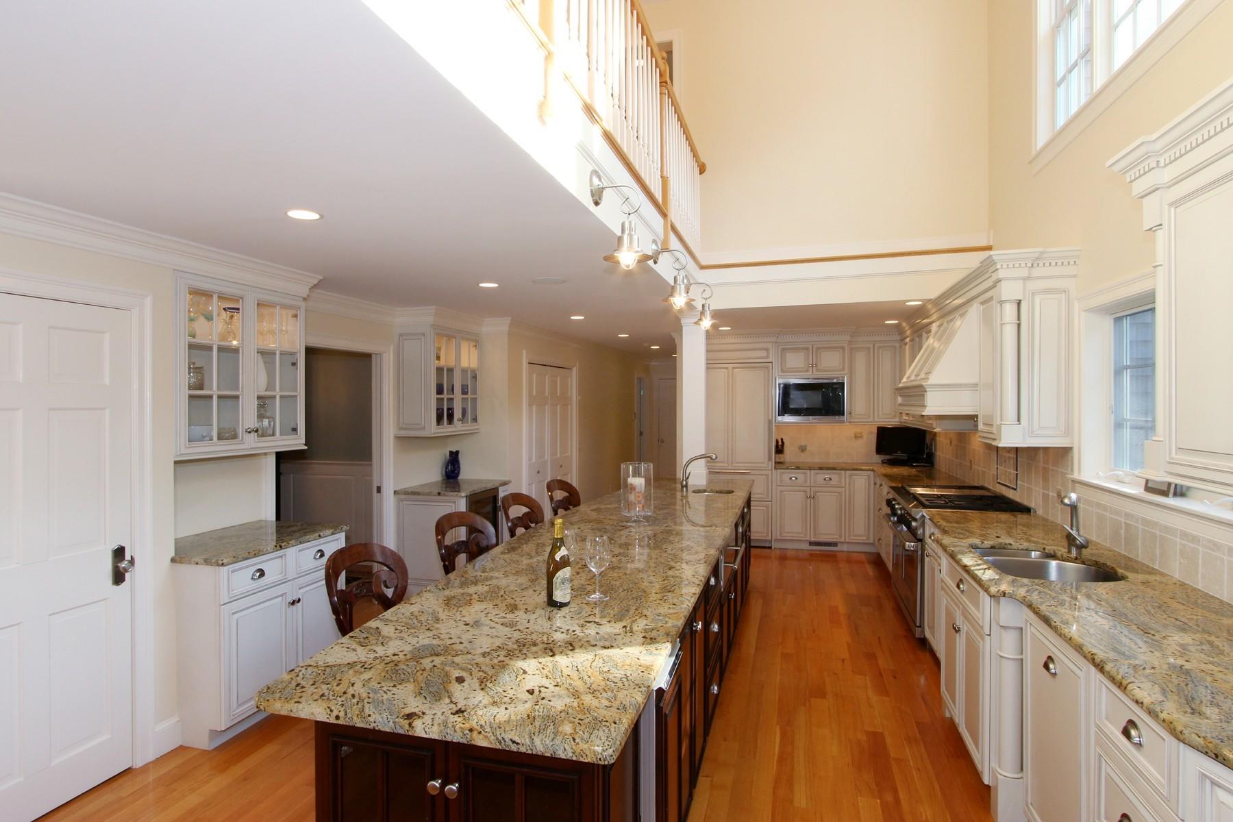 78 Neel Road Harwich Port, MA 02646 - Photo 4 of 15 a large kitchen with granite countertop lots of counter top space and stainless steel appliances