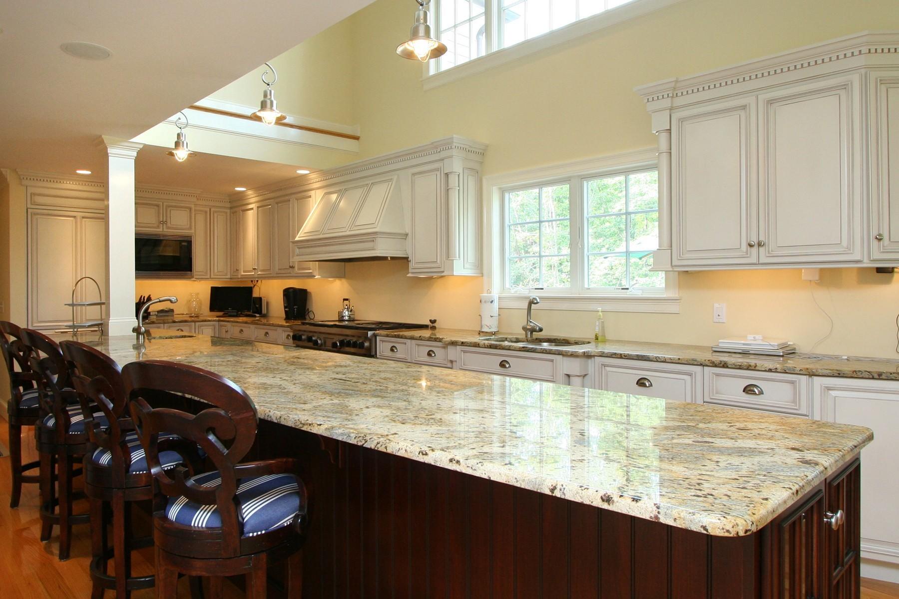 78 Neel Road Harwich Port, MA 02646 - Photo 5 of 15 a kitchen with granite countertop a sink a counter top space and cabinets