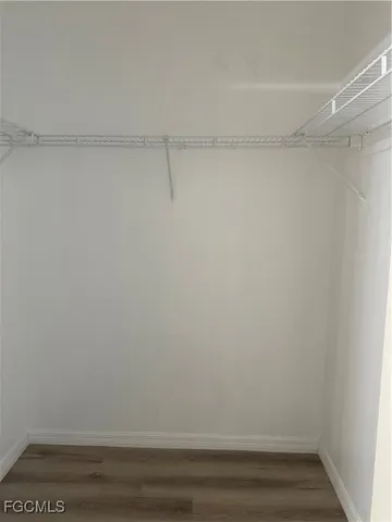 a view of an empty walk in closet