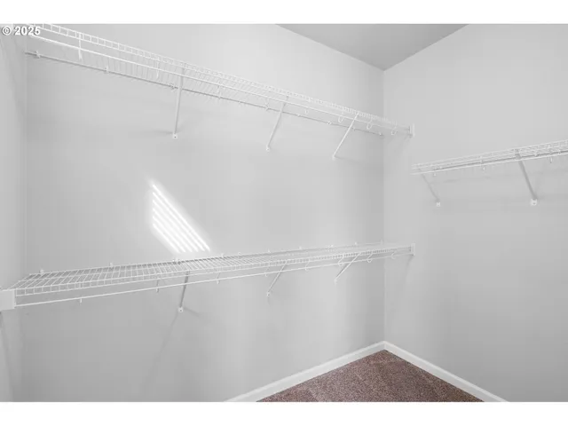 a view of small space with racks on the wall