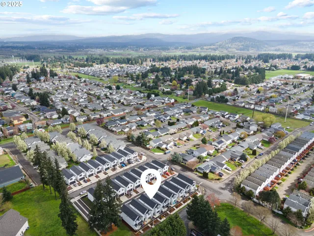 an aerial view of multiple house
