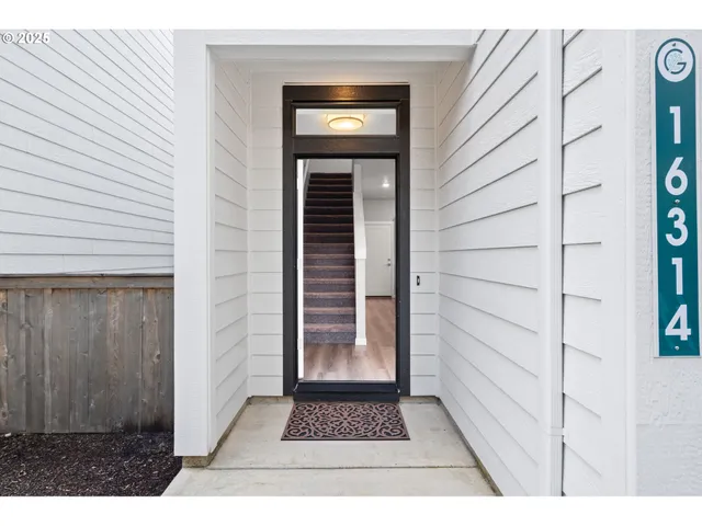 a view of a door and a window
